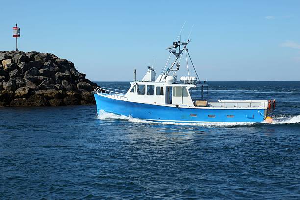 istock Boat arriving from fishing 528243445