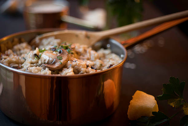 istock Mushroom and Sun-dried Tomato Risotto in a Copper Saucepan 528246151