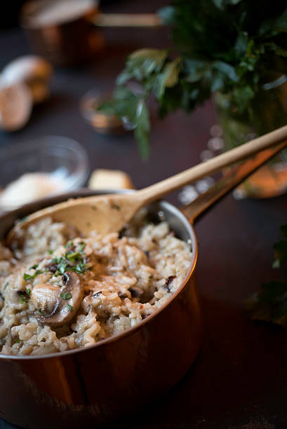 istock Mushroom and Sun-dried Tomato Risotto in a Copper Saucepan 528246161