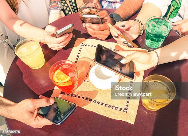 Close Up Of Multiracial Friend Hands With Mobile Smart Phones Stock Photo - Download Image Now