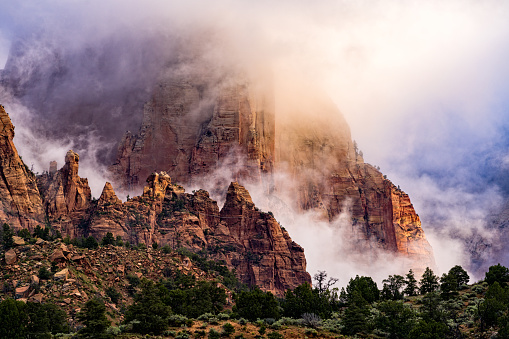 Dramatic Clouds and Red Rock Canyons in Zion - Scenic landscape in Zion National Park after a clearing storm.  Utah, USA.