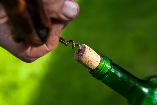 Cork screw and wine bottle