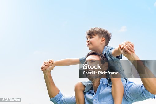 istock Father and son together 528286906