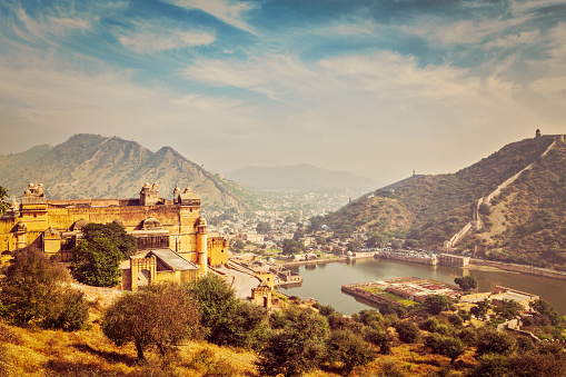 Indian travel famous tourist landmark - vintage retro effect filtered hipster style image of  view of Amer (Amber) fort and Maota lake, Rajasthan, India