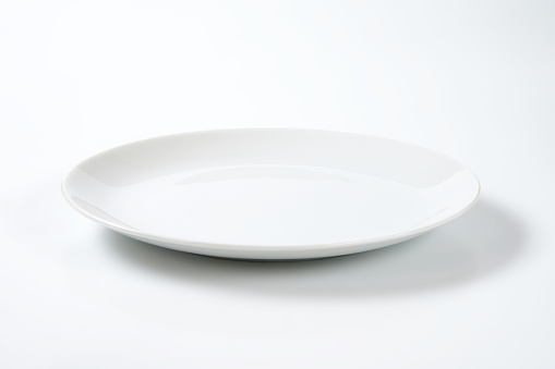 Coup shaped white plate