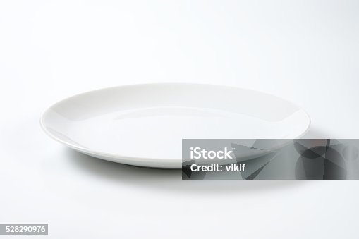 istock Coup shaped white plate 528290976