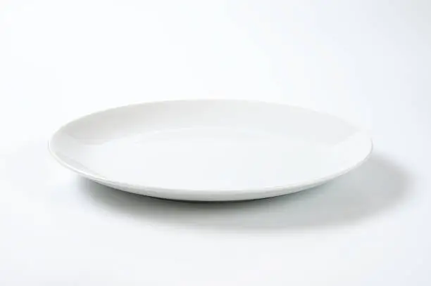 Photo of Coup shaped white plate