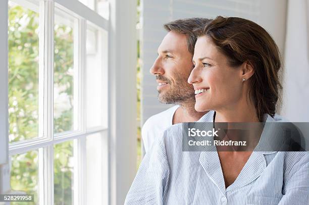 Family Future Stock Photo - Download Image Now - Two Parents, Looking Through Window, Family