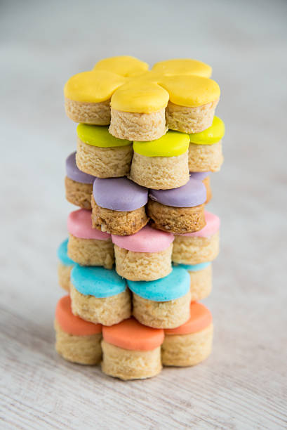 Colorful flower form homemade fondant covered cookies