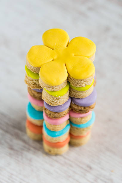 Colorful flower form homemade fondant covered cookies