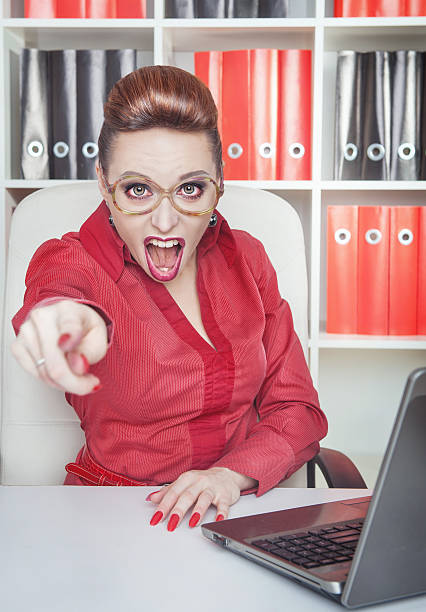 istock Angry crazy woman boss pointing out 528300700