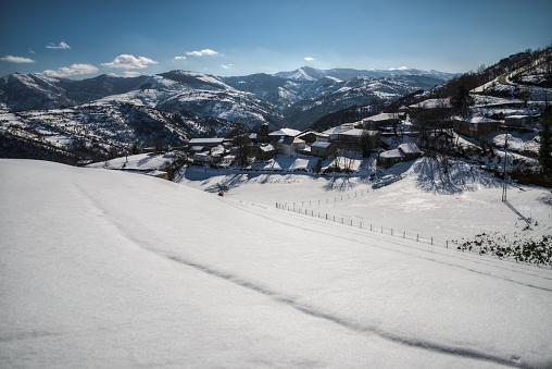 Mountain Ski Lift and Italian Dolomites Mountains, Snow covered Ski Slope, Italy.