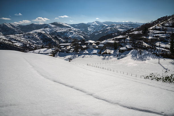 Snowy village in the courel range stock photo