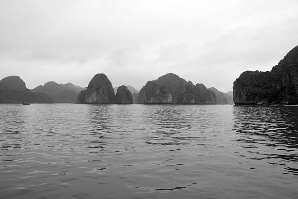 Lan Ha bay karst formations, Vietnam Lan Ha bay karst formations. The 300 or so karst islands and limestone outcrops of Lan Ha are located south east of Cat Ba island and have numerous white-sand beaches.  haiphong province photos stock pictures, royalty-free photos & images