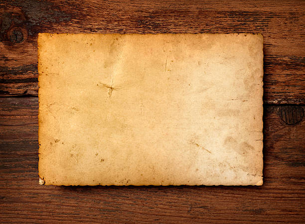 istock old photo postcard and clothes peg on wood 528303512