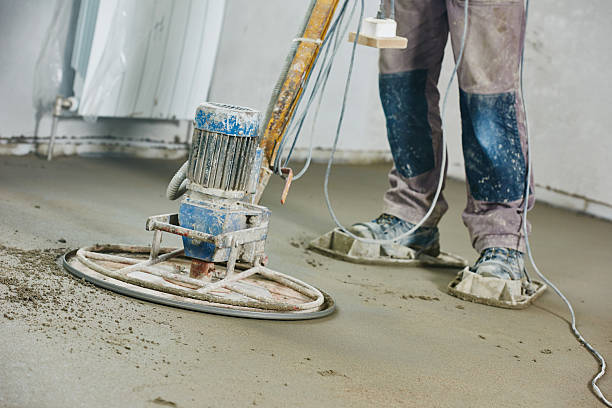 istock floor machine grinding by power trowel 528304682
