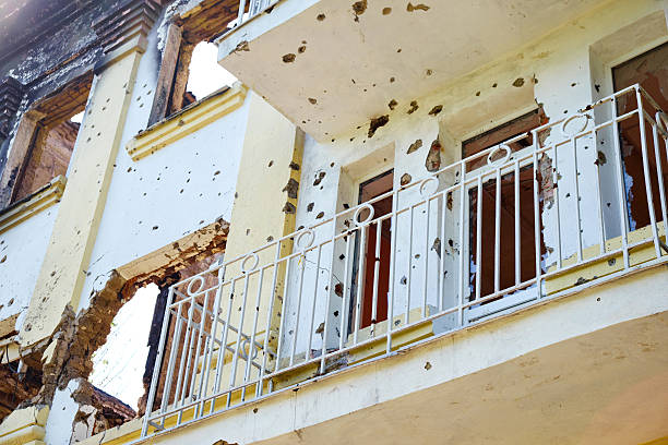 Ruined Police Department of Mariupol Mariupol, Ukraine - September 6, 2014: Mariupol, Ukraine - September 6, 2014: Shooting after-effect of fighting between government special forces and terrorists at Police Department of Mariupol  on May 9, 2014. 2014 stock pictures, royalty-free photos & images