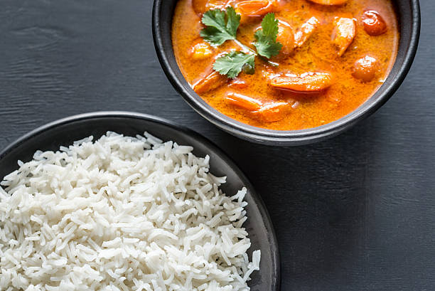 istock Thai yellow curry with seafood and white rice 528305918