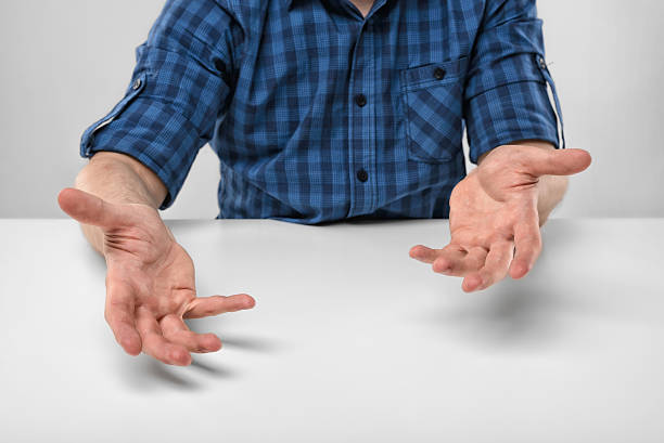 istock Cropped portrait of a man sits gesticulating 528306760