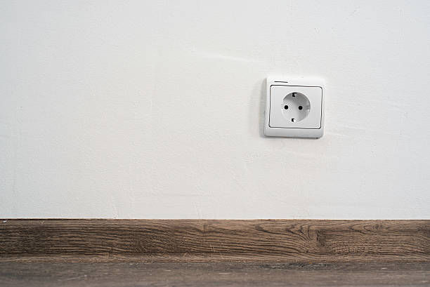 outlet on wall electrical outlet on white wall. home design Faceplate stock pictures, royalty-free photos & images