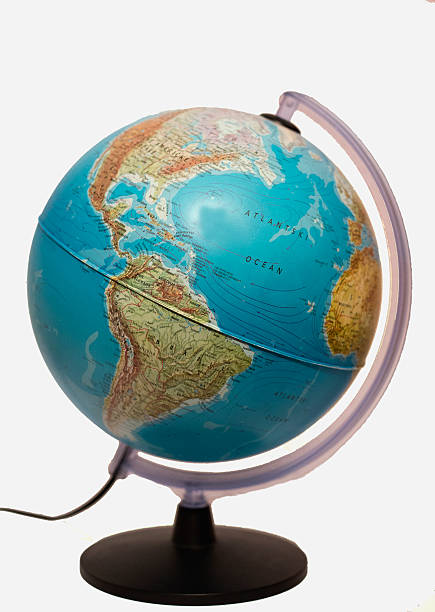istock Antique world globe isolated on white background. 528308022