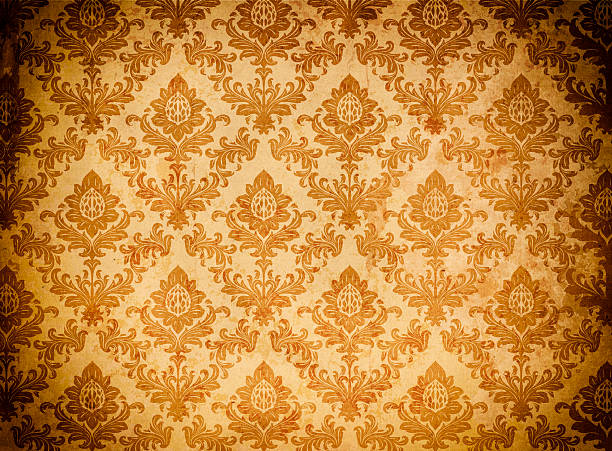 istock Old grunge paper with floral ornament. 528311629