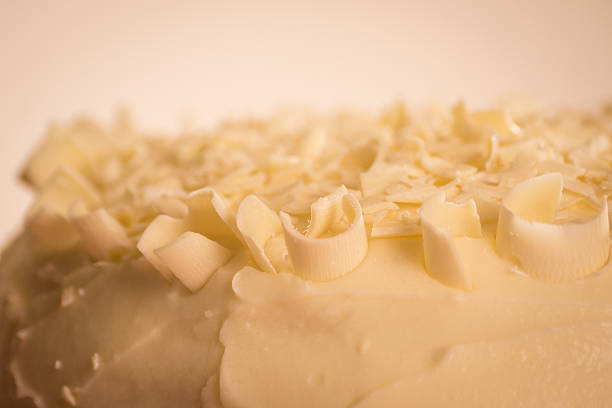 Gourme Cheesecake with white chocolate shavings-close up