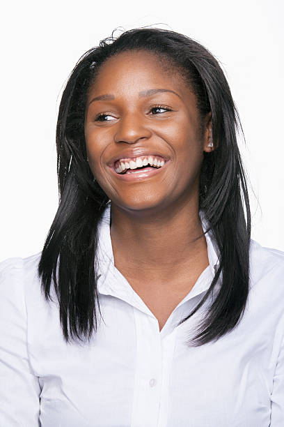 istock Young woman laughing and looking away 528313527