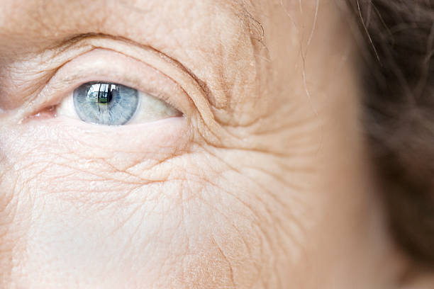 istock Blue Eye of Elderly Woman 528313671