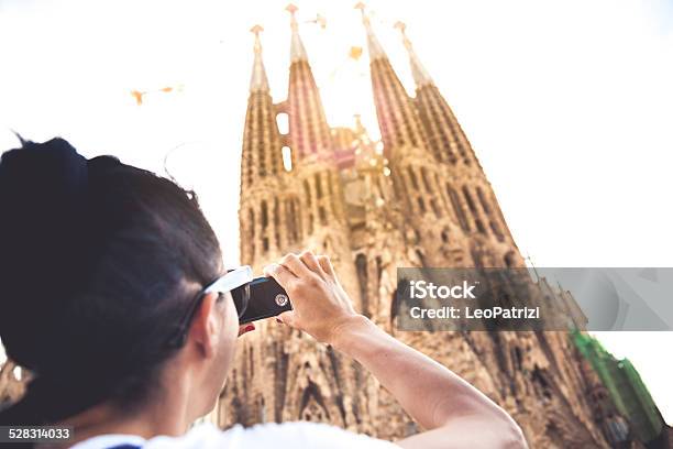 Tourist Taking Pictures To Sagrada Familia Stock Photo - Download Image Now - Adult, Antoni Gaudí, Architectural Feature