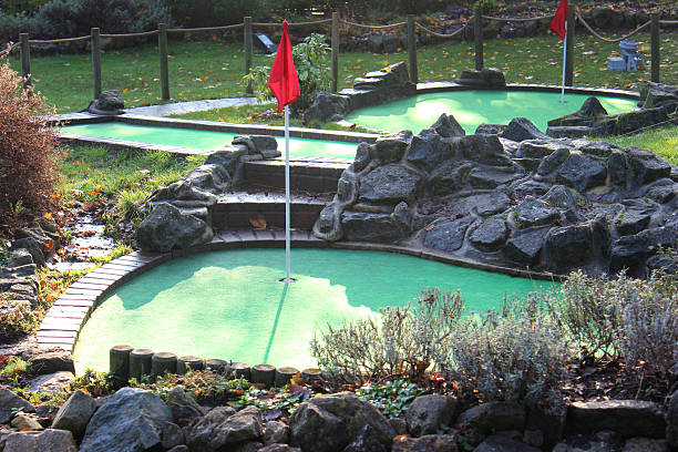 istock Image of miniature golf course (crazy golf), putting greens / flags 528314163
