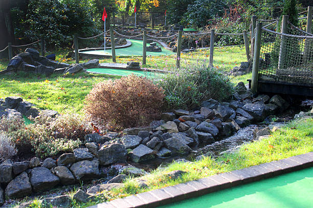 istock Image of miniature golf course (crazy golf), putting greens / flags 528314181
