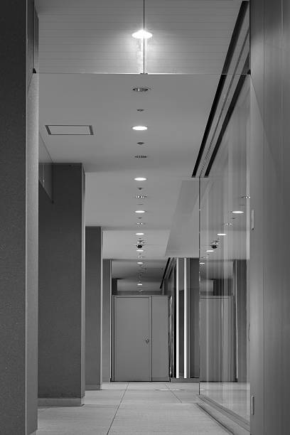 istock Perspective of office corridor in the modern office building 528315605