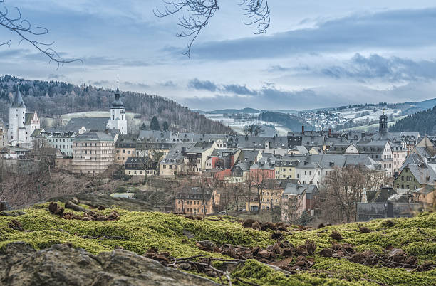 Beautiful winter landscape in the Erzgebirge (Ore Moutains). Winter moss and elevated view on town of Schwarzenberg (near Aue), called the Pearl of the Ore Mountains.
