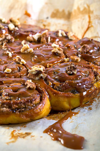 istock Pumpkin buns with salted caramel closeup. 528317305