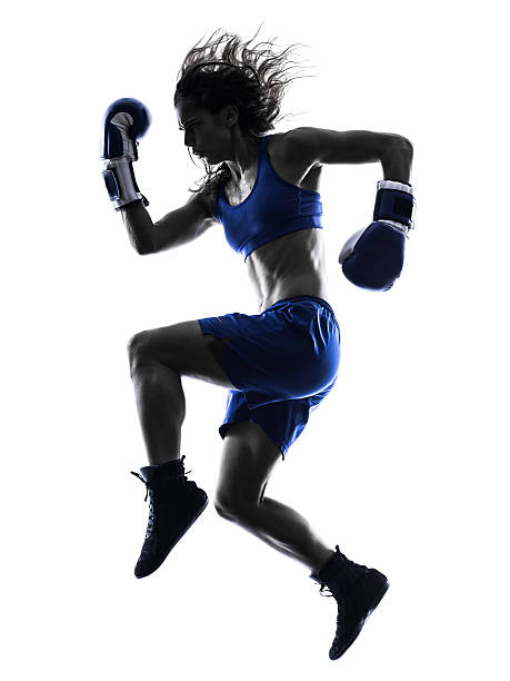 istock woman boxer boxing kickboxing silhouette isolated 528317315
