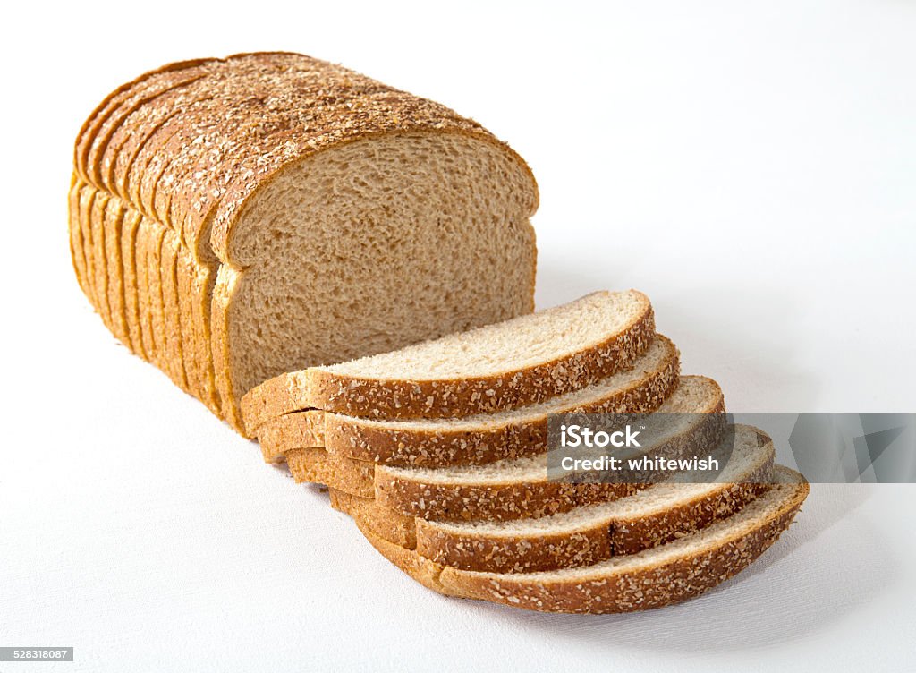 Sliced Multi-Grain Bread Sliced multi-grain bread on white background Bread Stock Photo
