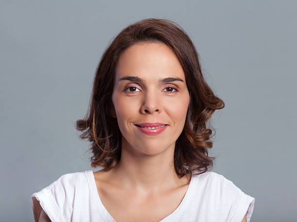 istock Woman is smiling an looking at You 528337459