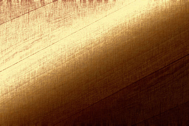 istock Gold metallic background, golden foil, fabric texture, brown paper 528337745