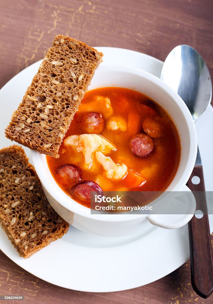 Cauliflower and sausage soup Cauliflower and sausage soup in a bowl Appetizer Stock Photo