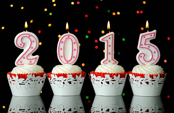 istock Happy New Year for 2015 red velvet cupcakes 528357993