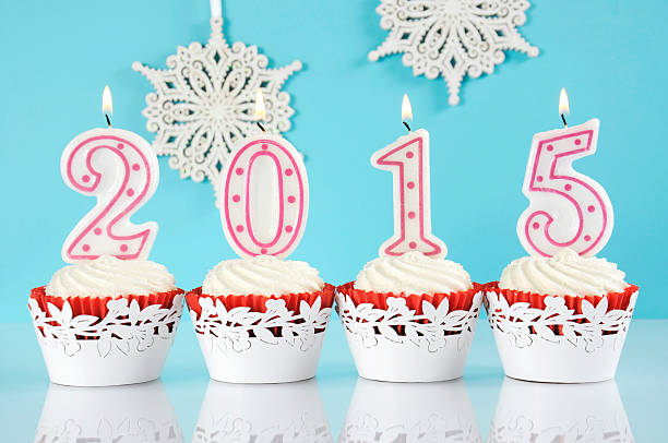 istock Happy New Year for 2015 red velvet cupcakes 528357995