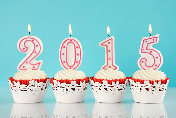 istock Happy New Year for 2015 red velvet cupcakes 528357997