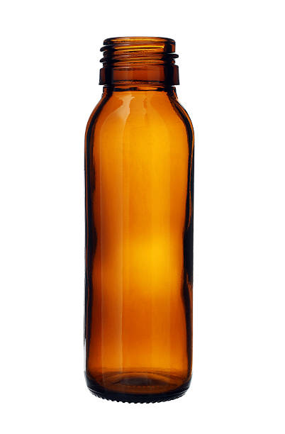 istock Slim Brown Glass Bottle Threaded Mouth isolated on white background 528359217