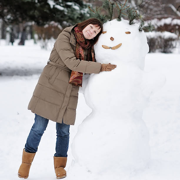 istock Woman having fun in winter 528359855