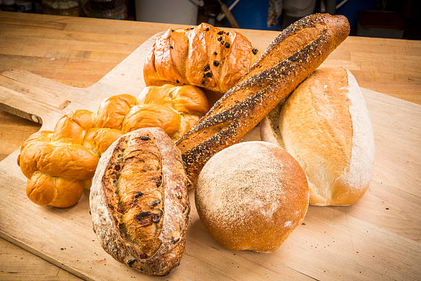 Collection of artisan breads on baker's peel