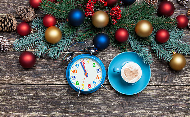 istock Hot cappuccino with christmas tree shape on a wooden table 528360679