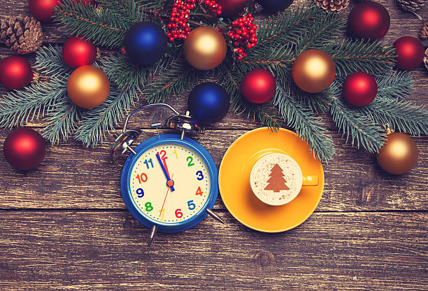 istock Hot cappuccino with christmas tree shape on a wooden table 528360683