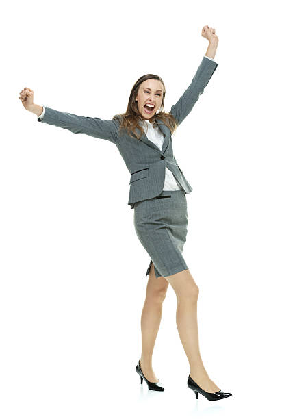 istock Excited businesswoman cheering 528361889