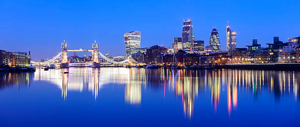 istock Illuminated reflective waterfront view of a Tower Bridge. 528362159